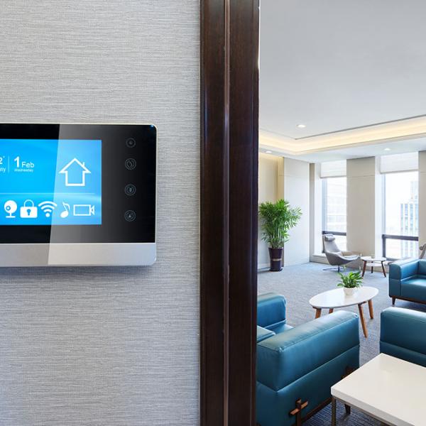 an image of a smart home tablet mounted on a wall